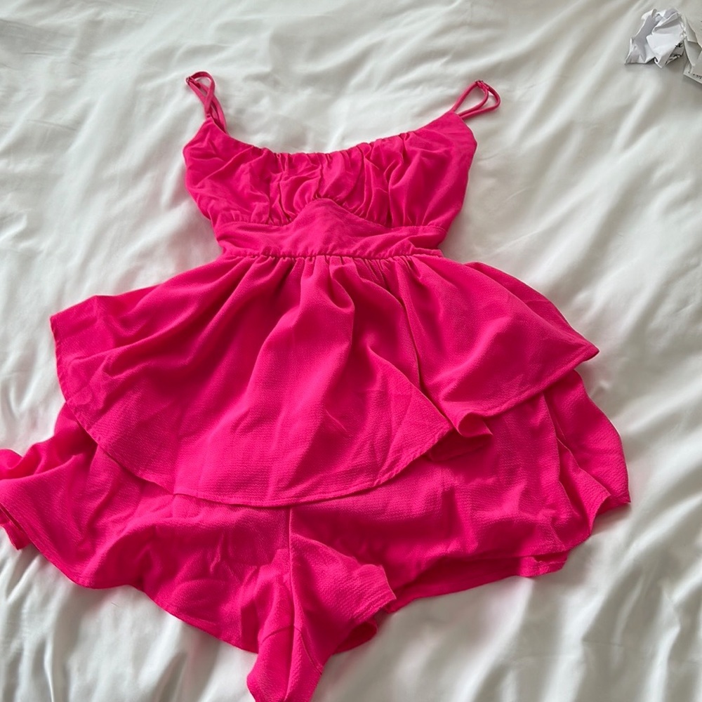 cora ruffle romper pink size XS from LUCY IN THE SKY. did not fit, never worn